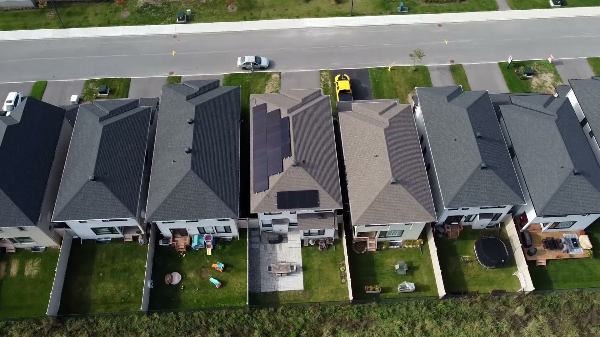 The finished Orléans array on its house, among the neighbours, seen from the air